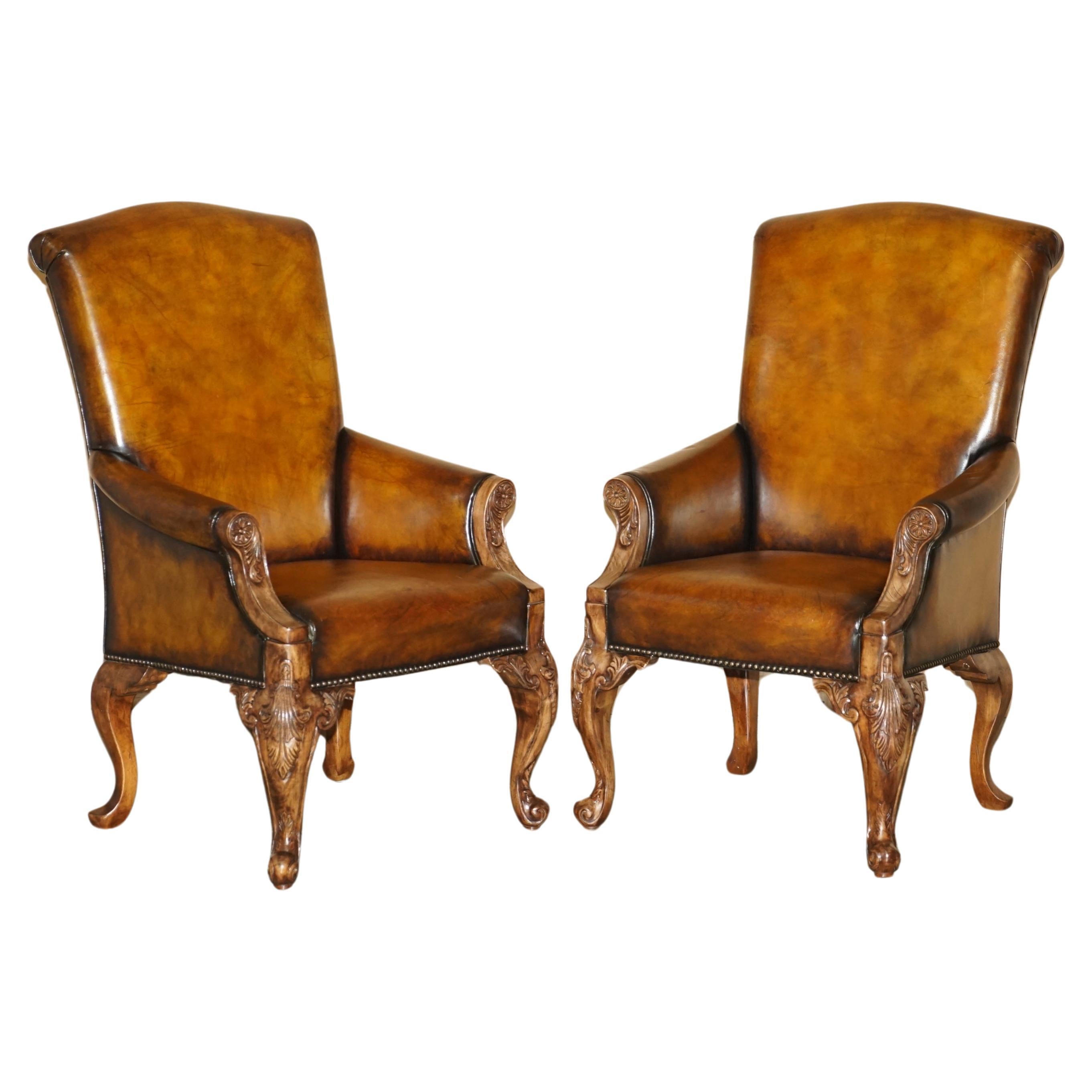 PAIR OF ANTIQUE HEAVILY CARved HAND DYED BROWN LEATHER RESTORED THRONE ARMCHAIRs im Angebot