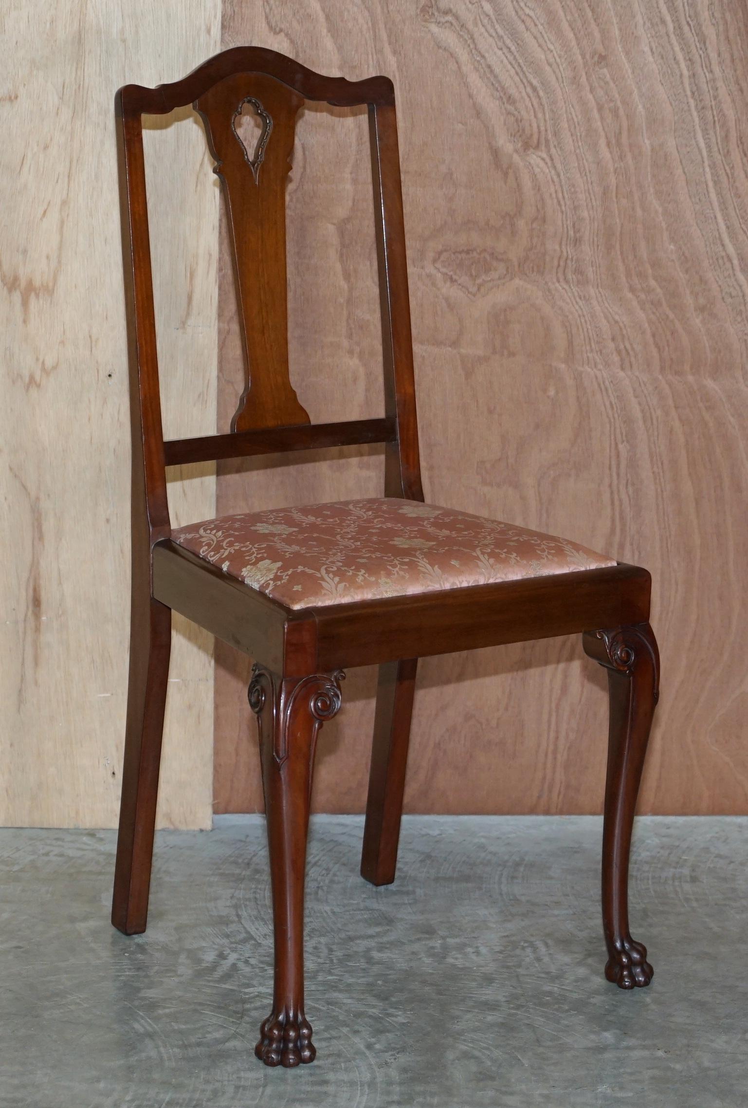 We are delighted to offer for sale this stunning pair of late Victorian Honduras Mahogany side chairs with ornately carved Lion’s Hairy paw feet

These chairs are of the finest quality, the timber was extremely expensive new and was being imported