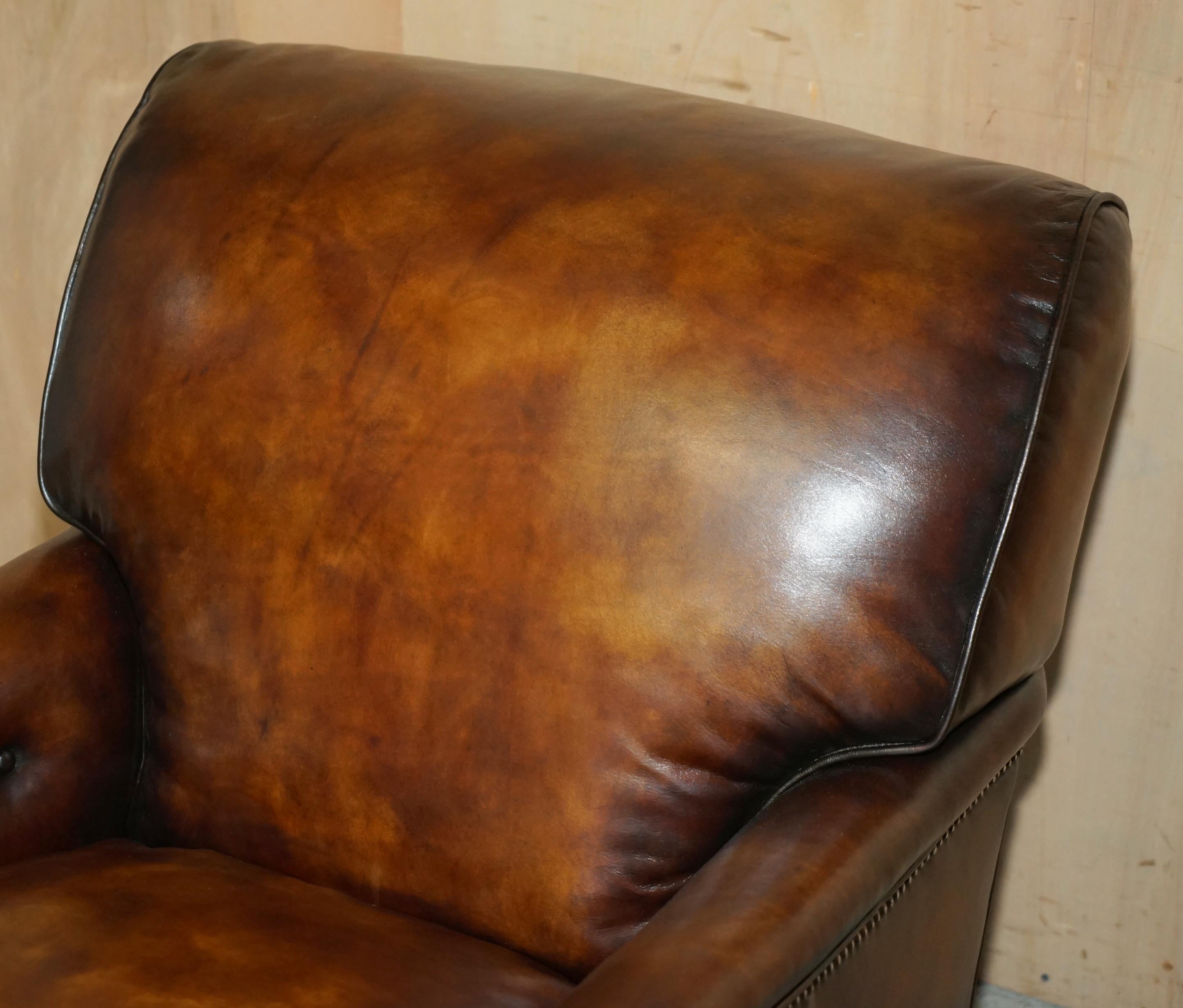 English PAIR OF ANTIQUE HOWARD & SON's BRIDGEWATER BROWN LEATHER ARMCHAiRS & FOOTSTOOL For Sale