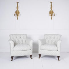 Pair of antique Howard style tub armchairs