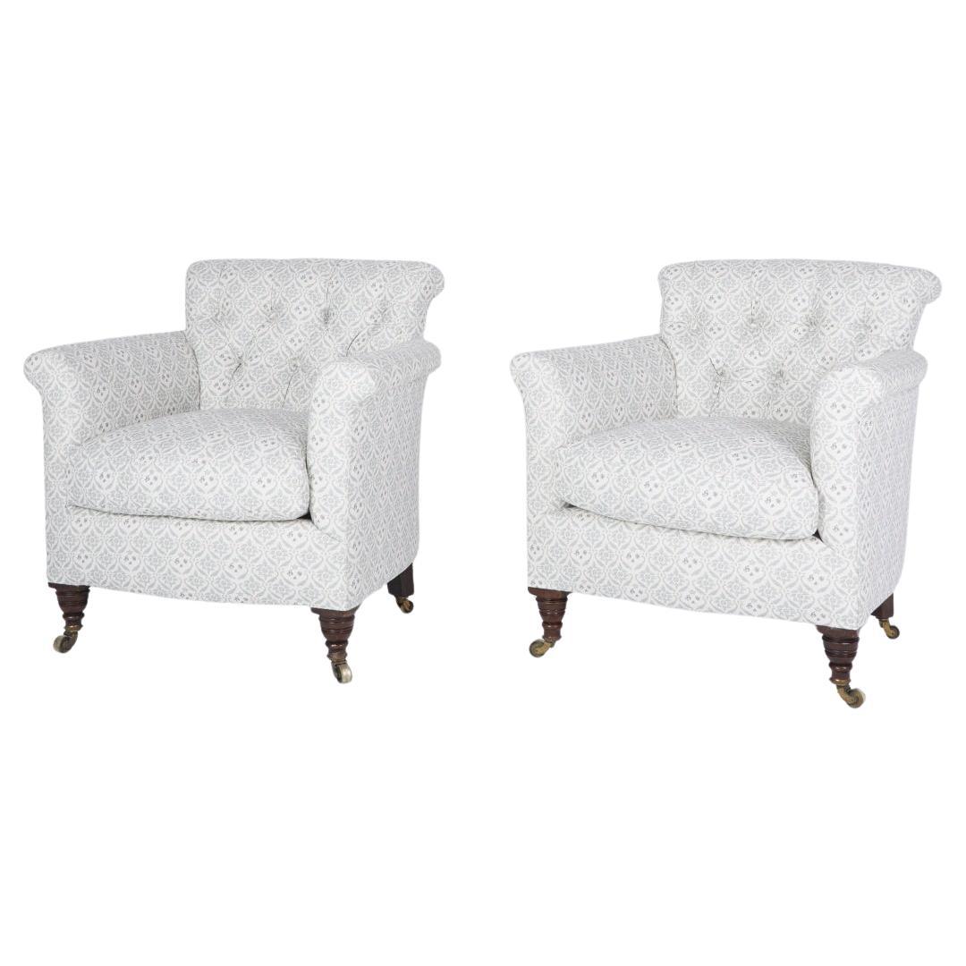 Pair of antique Howard style tub armchairs