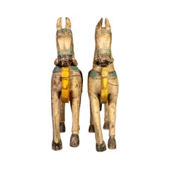 Pareja de caballos indios antiguos de madera