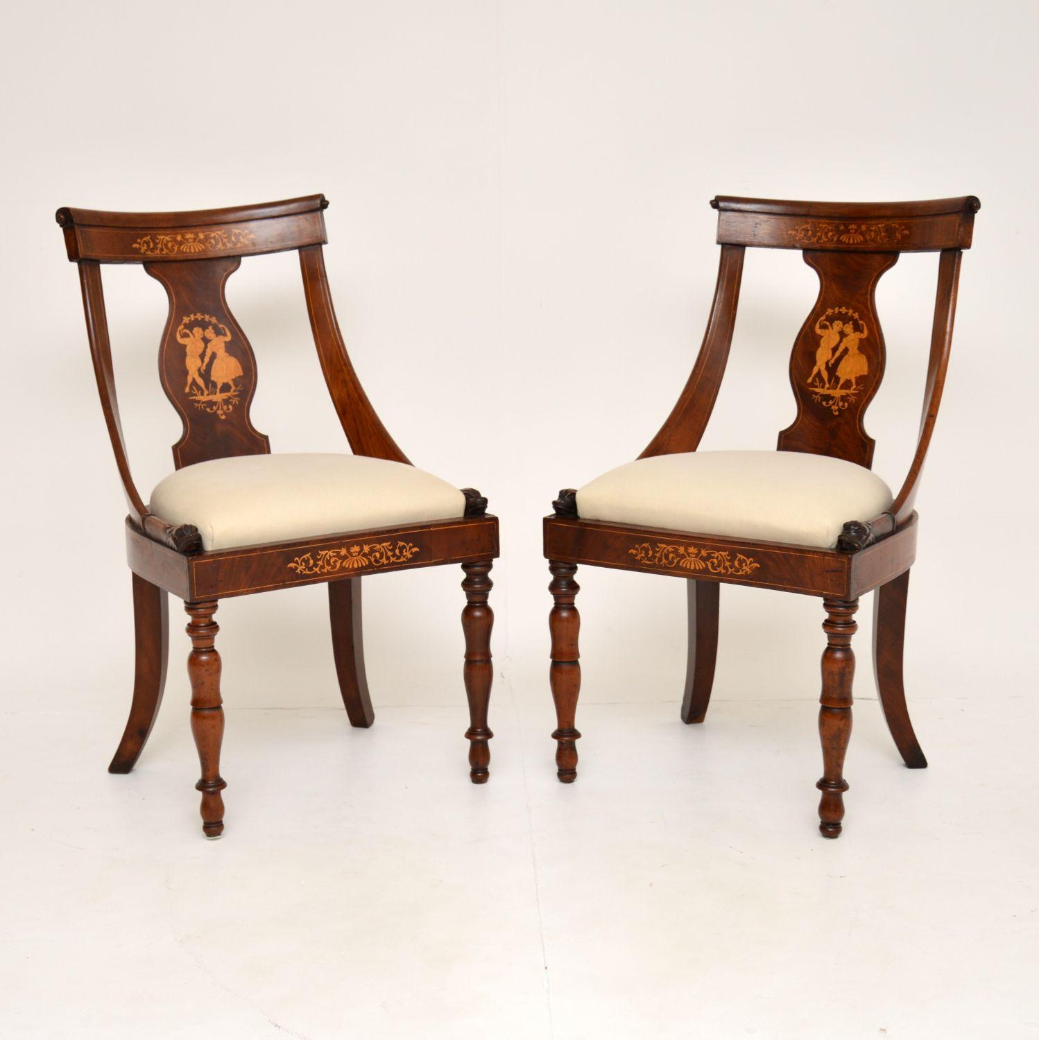 A superb and very rare pair of Dutch antique inlaid wood side chairs, dating from around the 1830-1840 period.

The quality is superb and these have a stunning neoclassical design. There are profuse satin wood inlays, and they sit on beautifully