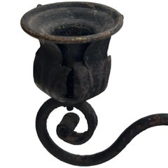 Coppia di antichi candelabri in ferro e porcellana