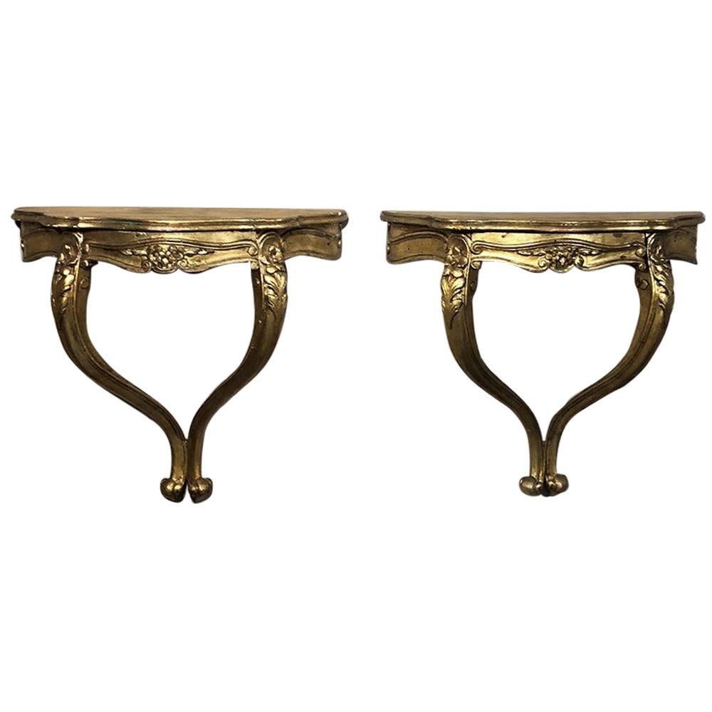 Paire de tables de nuit/consoles anciennes en bois doré baroque italien