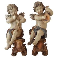 Coppia di antichi putti italiani in stile barocco revival
