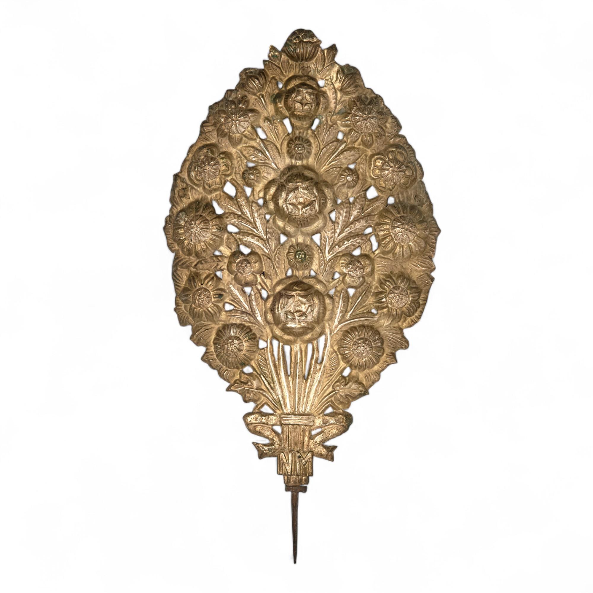 Rare and unusual pair of 19th century Italian candle reflector remnants, , hand crafted in brass with hammered floral motifs and the pressed initials NM, now highly decorative wall decor. 