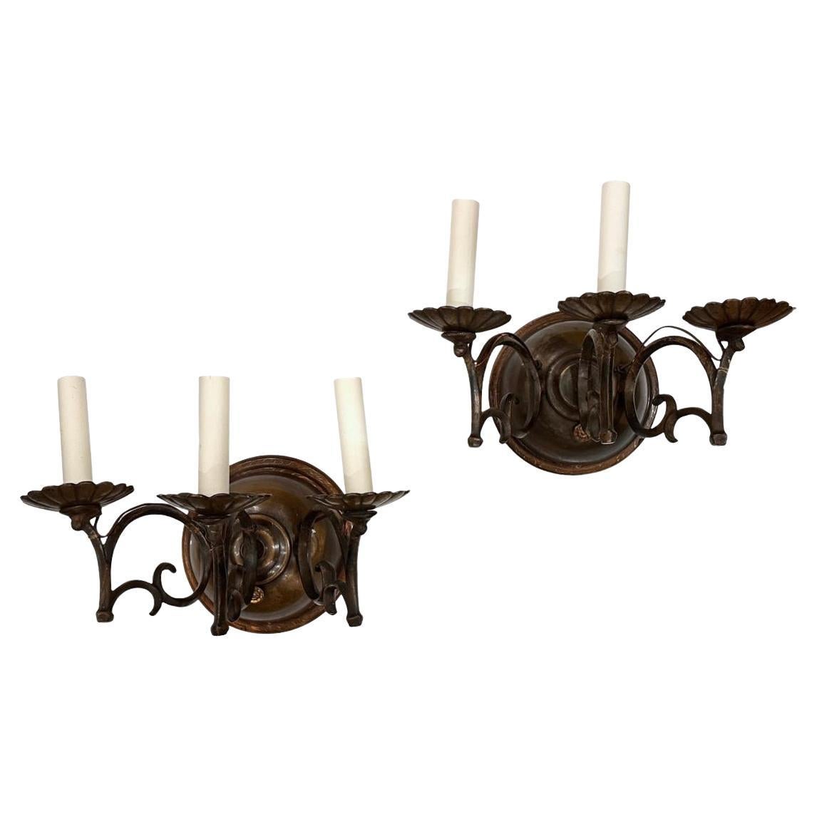 Coppia di antiche appliques in bronzo italiano