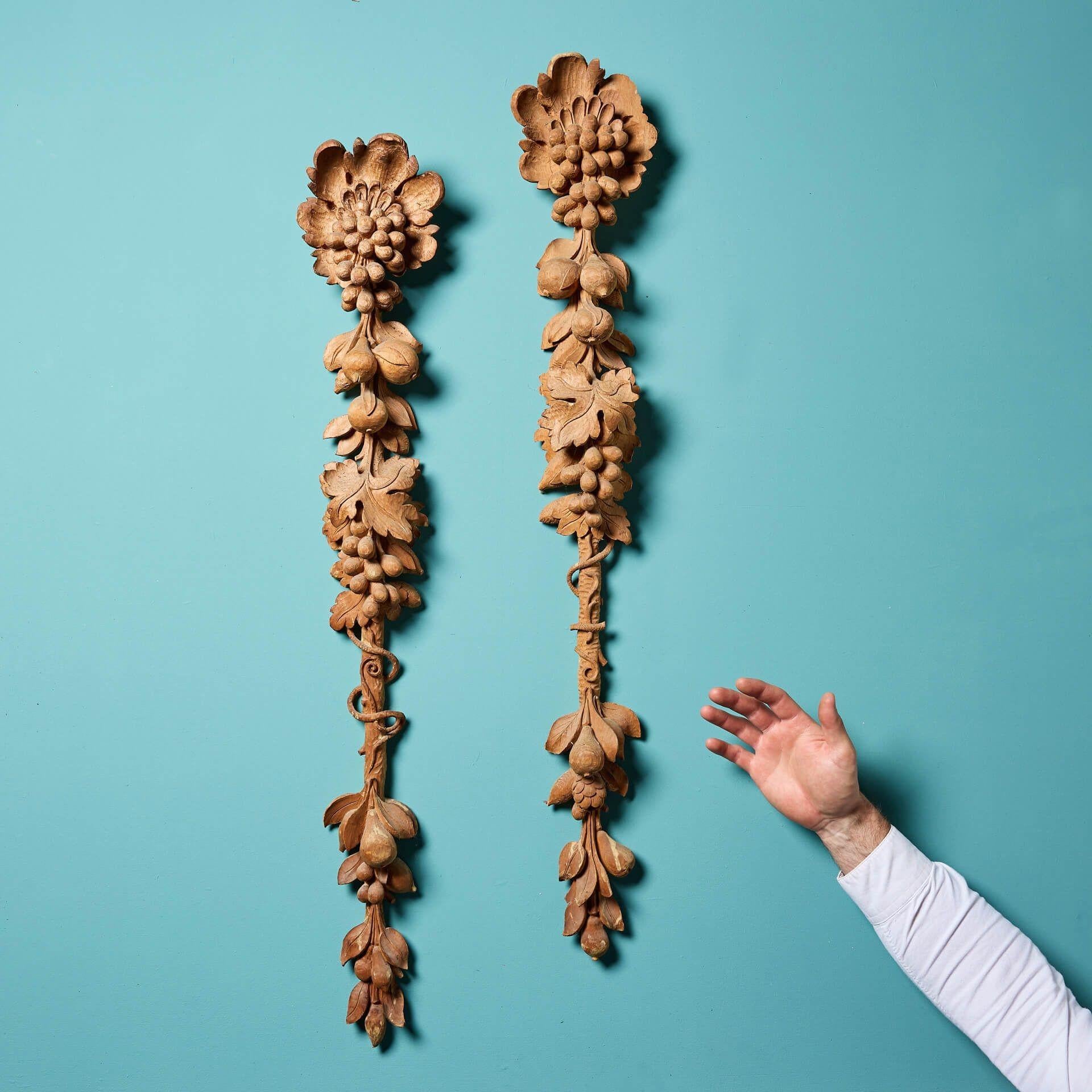 A pair of antique Italian carved pine wall hangings.

As a pair, these handcrafted wall hangings make the perfect decorative wall art for a period home looking to add style and grandeur.

Dating to circa 1850, this pair of unique carvings showcase