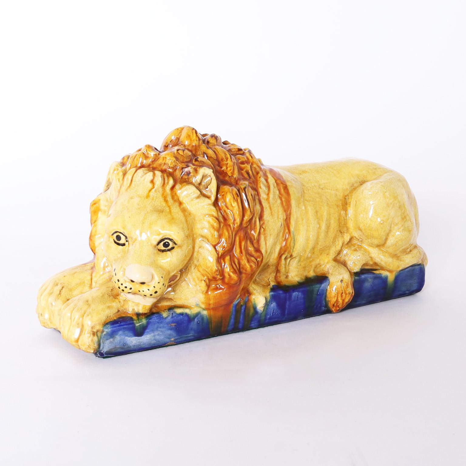 Glazed Pair of Antique Italian Earthenware Lions For Sale