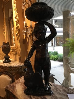 Zwei antike italienische:: ebonisierte:: geschnitzte Holzfiguren/Jardinières