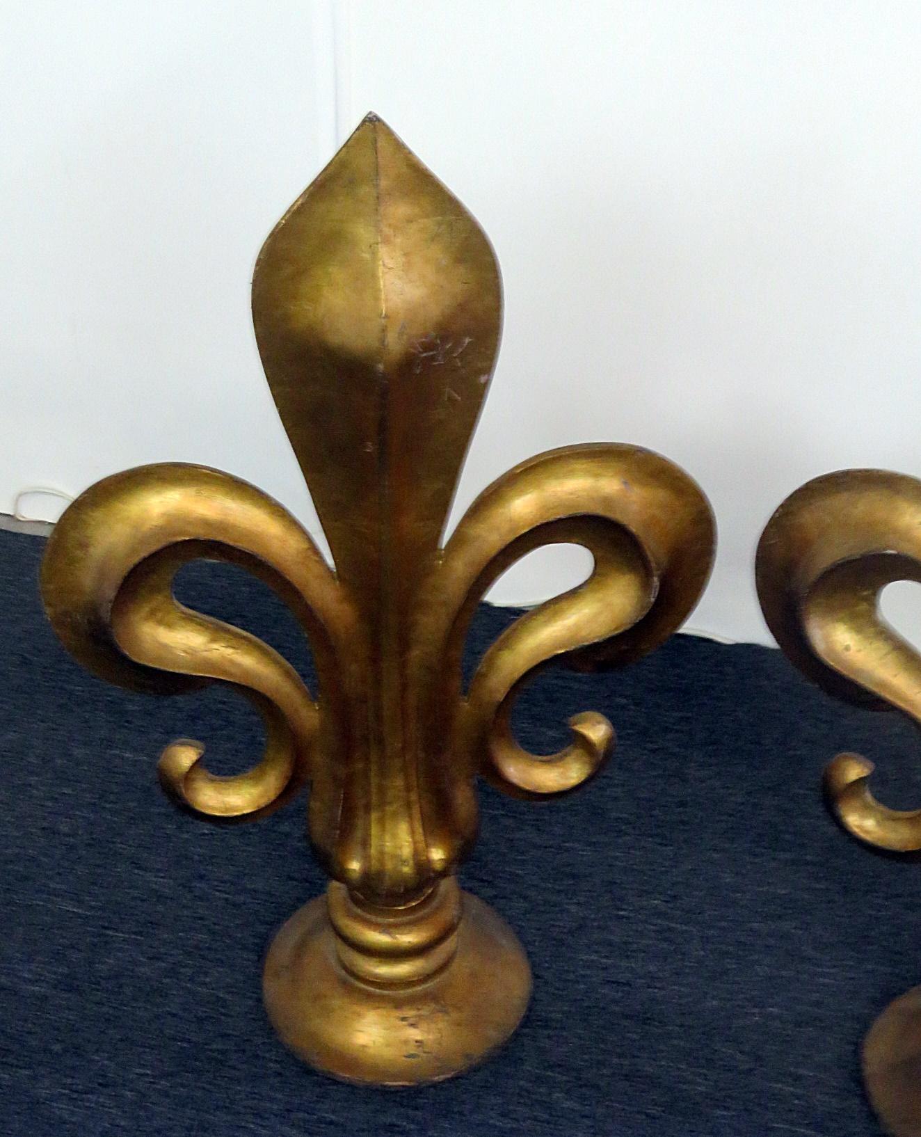 Pair of antique Italian giltwood Fleur-de-lis sculptures.