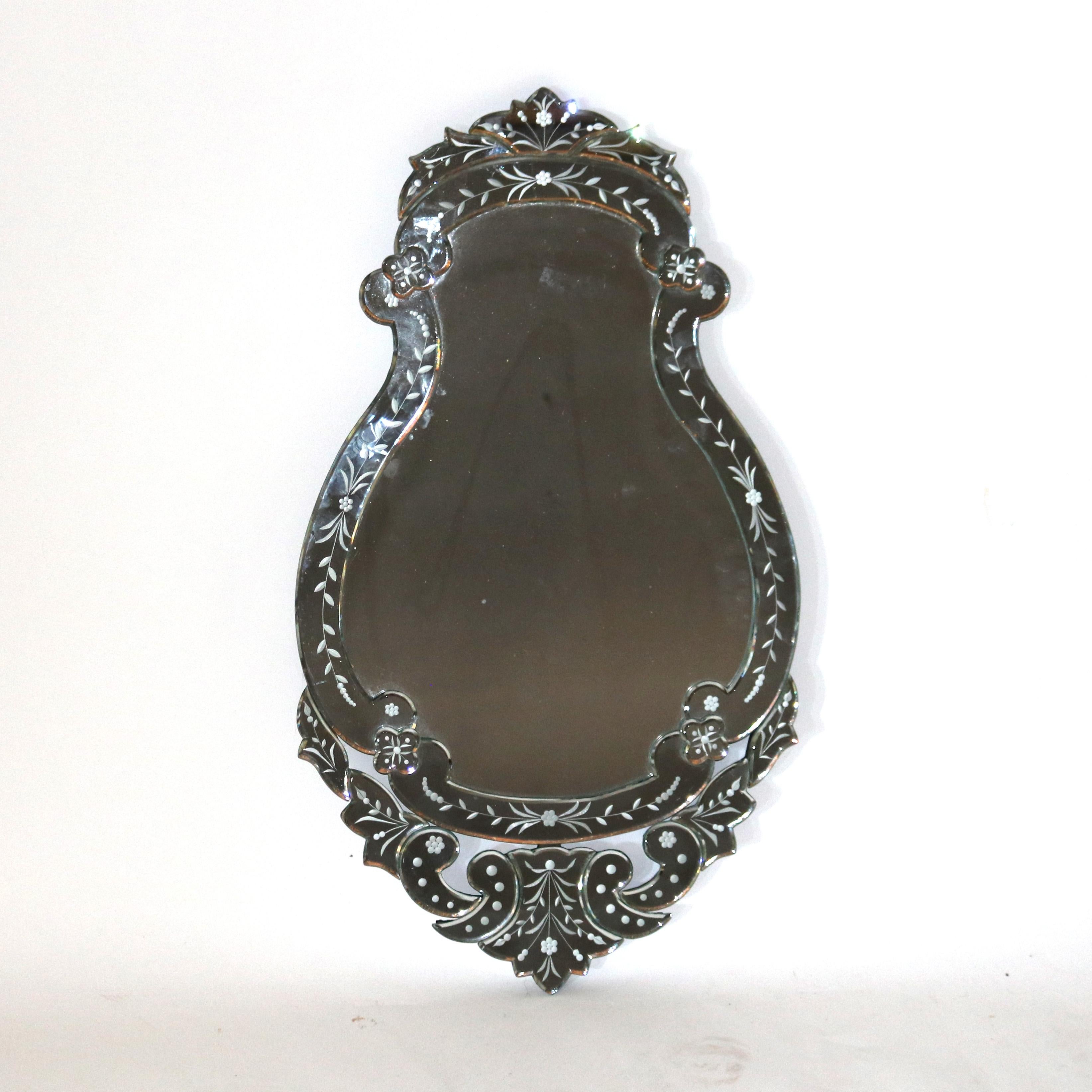 ***Inquire About Reduced In-House Delivery Rates - Reliable Professional Service & Fully Insured***

Pair of Antique Italian Foliate Etched Glass Shield Form Venetian Mirrors 20thC

Measure - 33