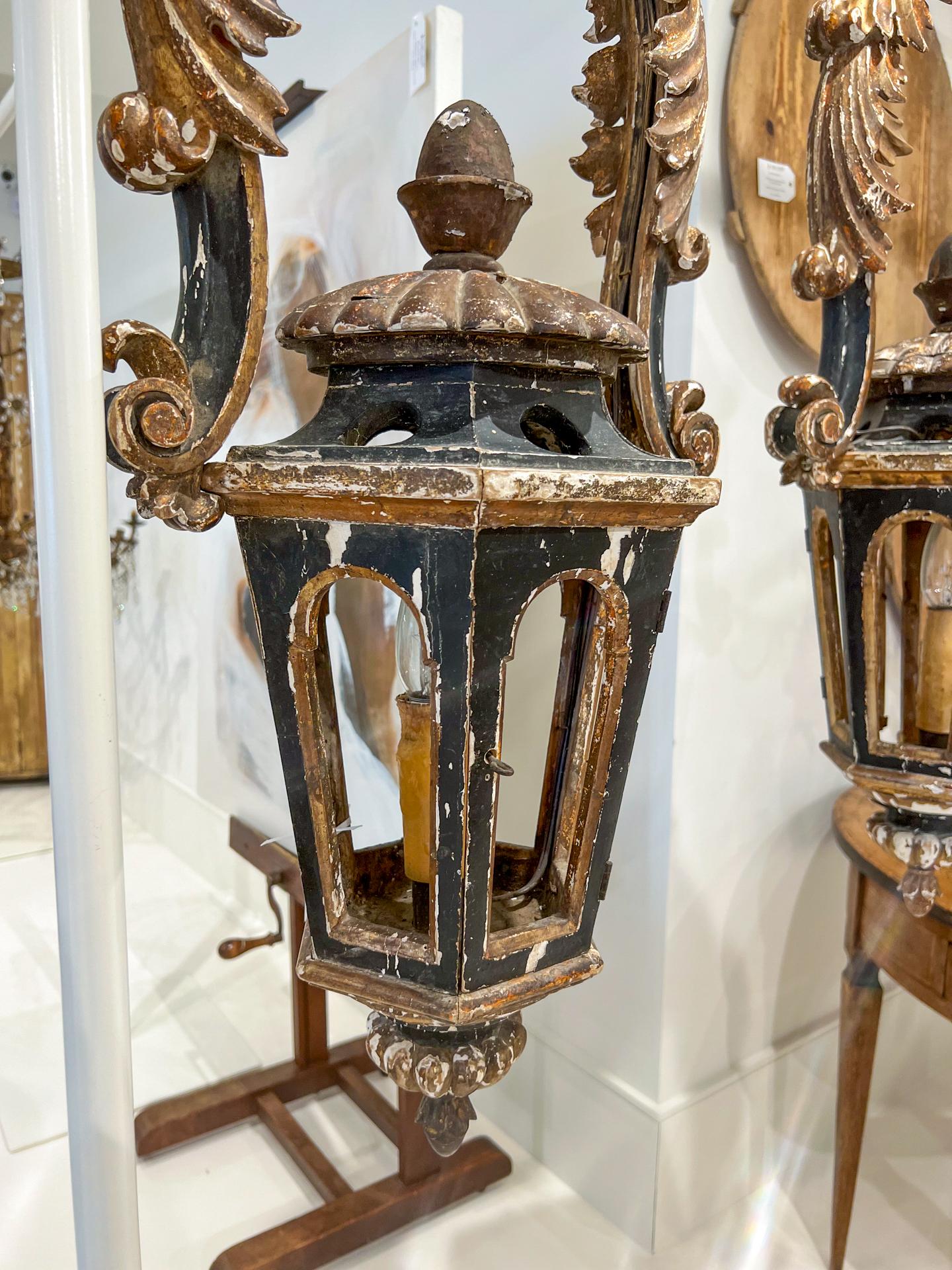 Pair of 18th century Italian lanterns gold leaf and painted black finish.
Large scale proportions, perfect for over a kitchen island.