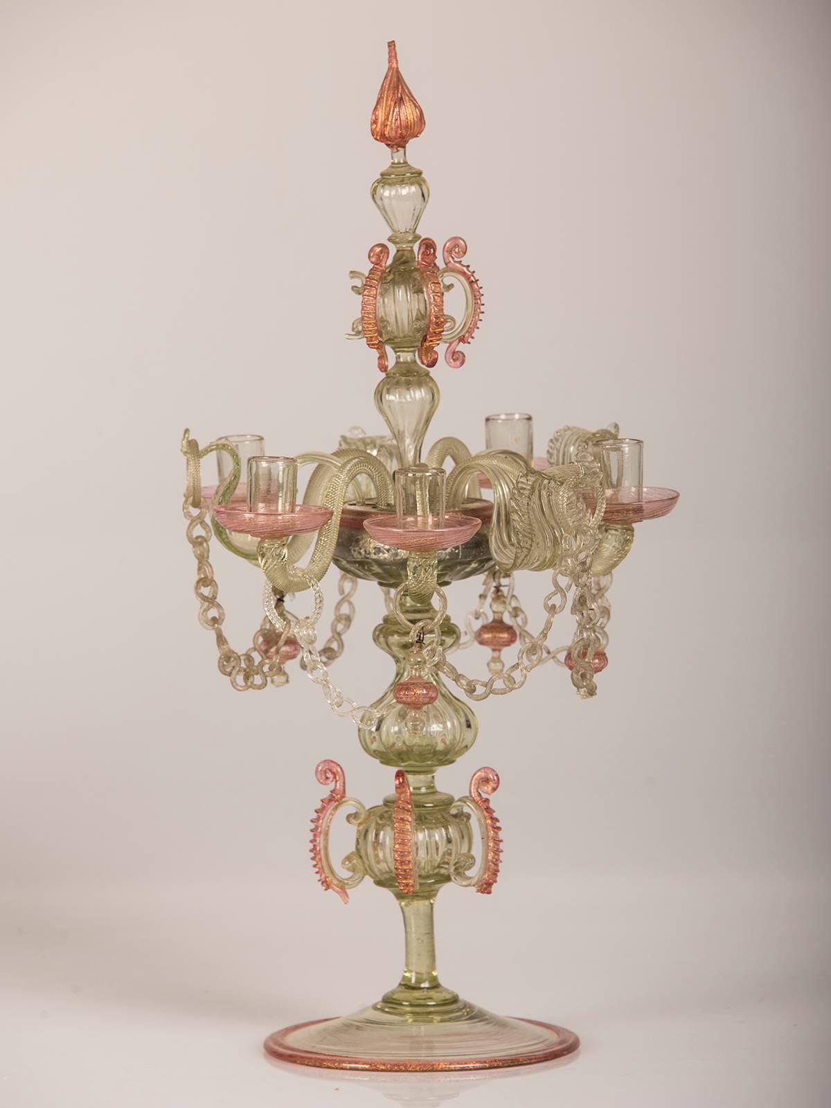 A marvelous pair of antique Italian Rococo period Venetian handblown glass candelabra from Italy circa 1880. The delicate colors and elaborate shape are all hallmarks of true period Venetian origin. Please use the zoom feature to see all the details