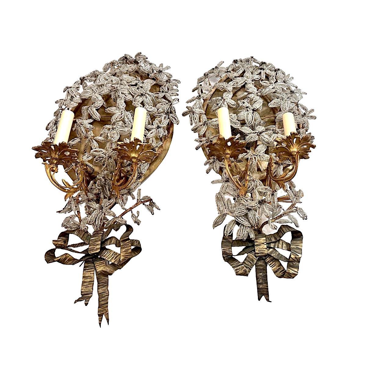 Pair of 19th Century bronze sconces with beaded crystal foliage.

Measurements:
Height: 28