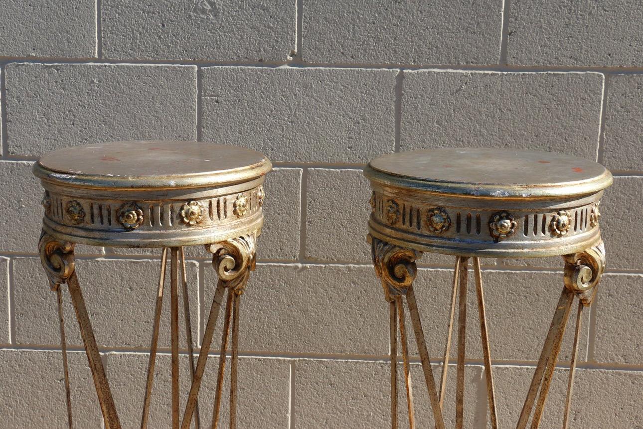 Wonderful pair of wood and wrought iron pedestals. They are made in Italy both of them have a stamp in the bottom, (check it out in the photos provided). They are in good vintage condition. They have some minor imperfections in the wood, ( they can