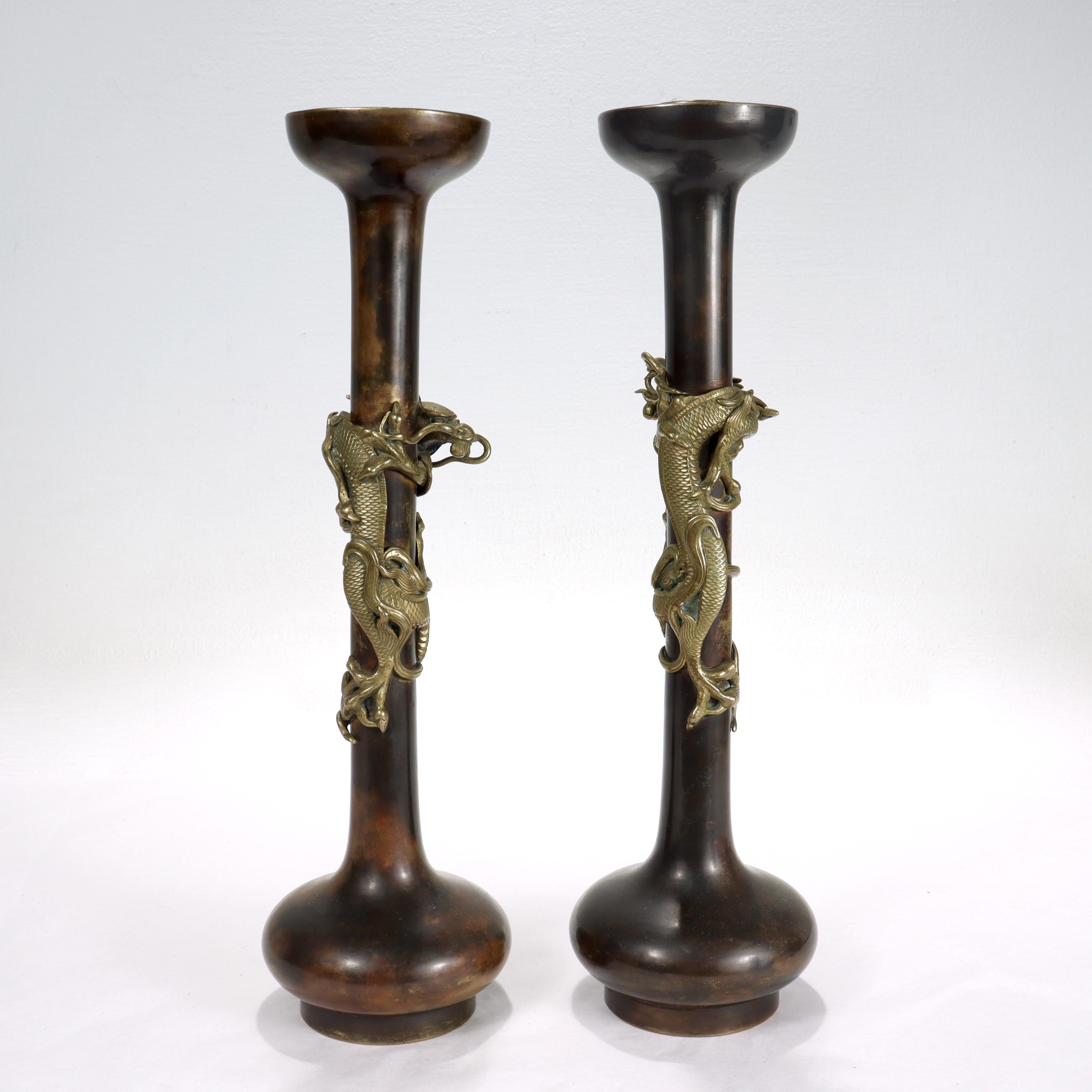 20th Century Pair of Antique Japanese Bronze Candlesticks with Coiled Dragons For Sale
