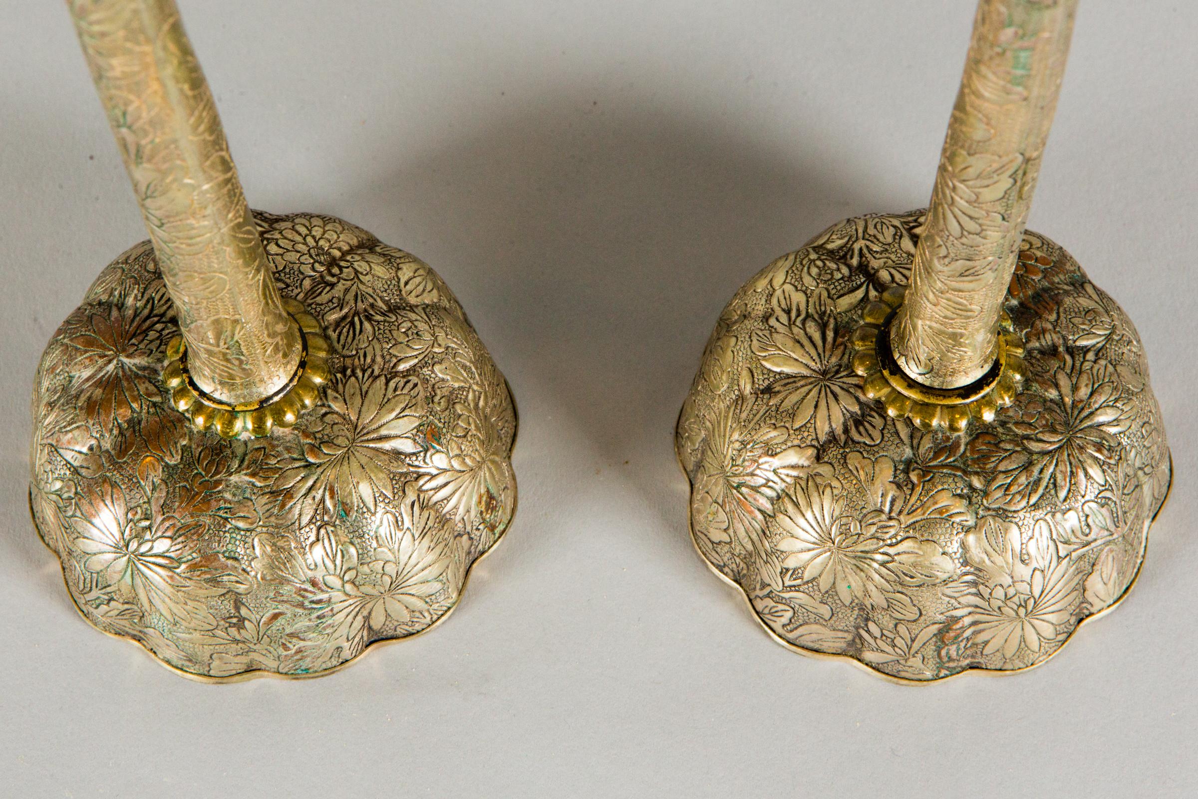 Pair of Antique Japanese Candlesticks, Meiji period (1868 - 1912) miniature candlesticks made of silver plated copper with an incised kiku (chrysanthemum) design. Good condition, comes with its original double chambered box.