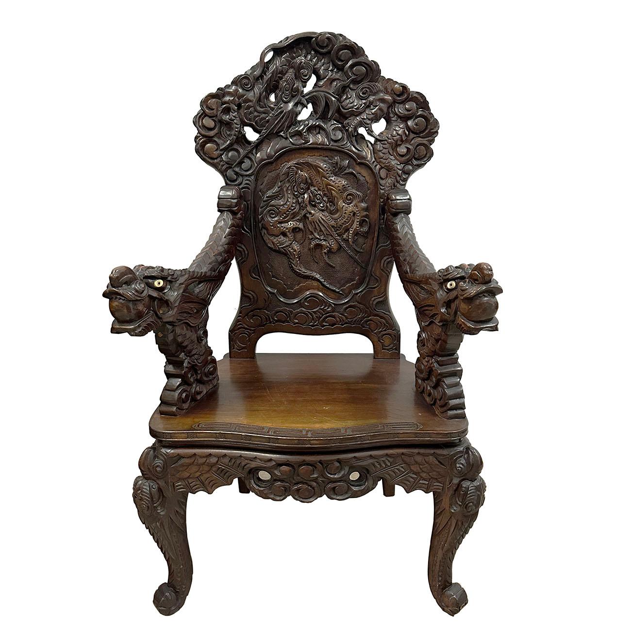 Up for sale are this stunning original Japanese Export 19th Century Meiji period hand carved Dragon Throne chair with intricate carving works of dragons all over the chairs. The dragon motif is mirrored into the arms with thick scales and gnarling