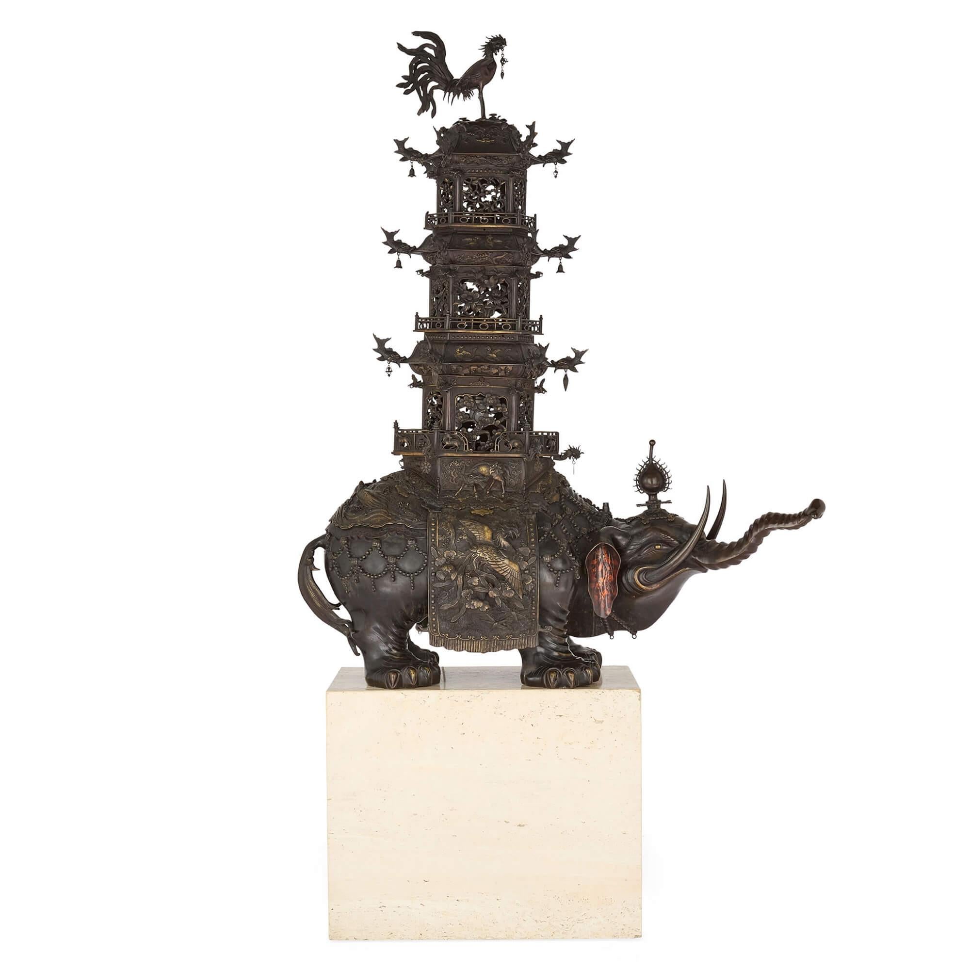 Pair of antique Japanese Meiji era bronze elephant and pagoda incense burners
Japanese, Late 19th Century
Sculpture: Height 151cm, width 122cm, depth 43cm
Base: Height 56cm, width 82cm, depth 40cm
Overall: Height 207cm, width 122cm, depth 43cm

This