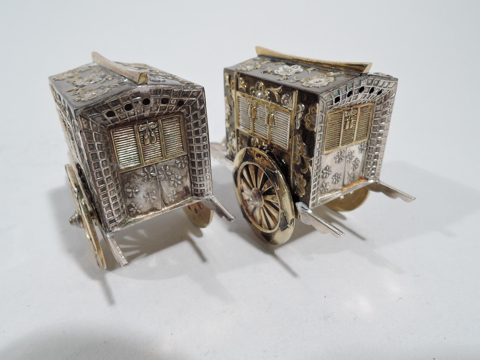 Pair of Japanese parcel gilt silver and niello novelty salt and pepper shakers, ca 1910. Each: In form of gosho-guruma, the exclusive ox-drawn cart that permitted aristocrats and members of the imperial family to travel in comparative comfort and