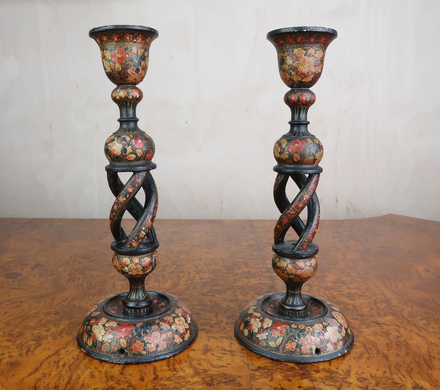 Beautiful pair of Kashmiri lacquer candlesticks

Amazing colours

Easily convertible to lamps

One of the candlesticks has been expertly repaired on the open twist part. It is not visible.



