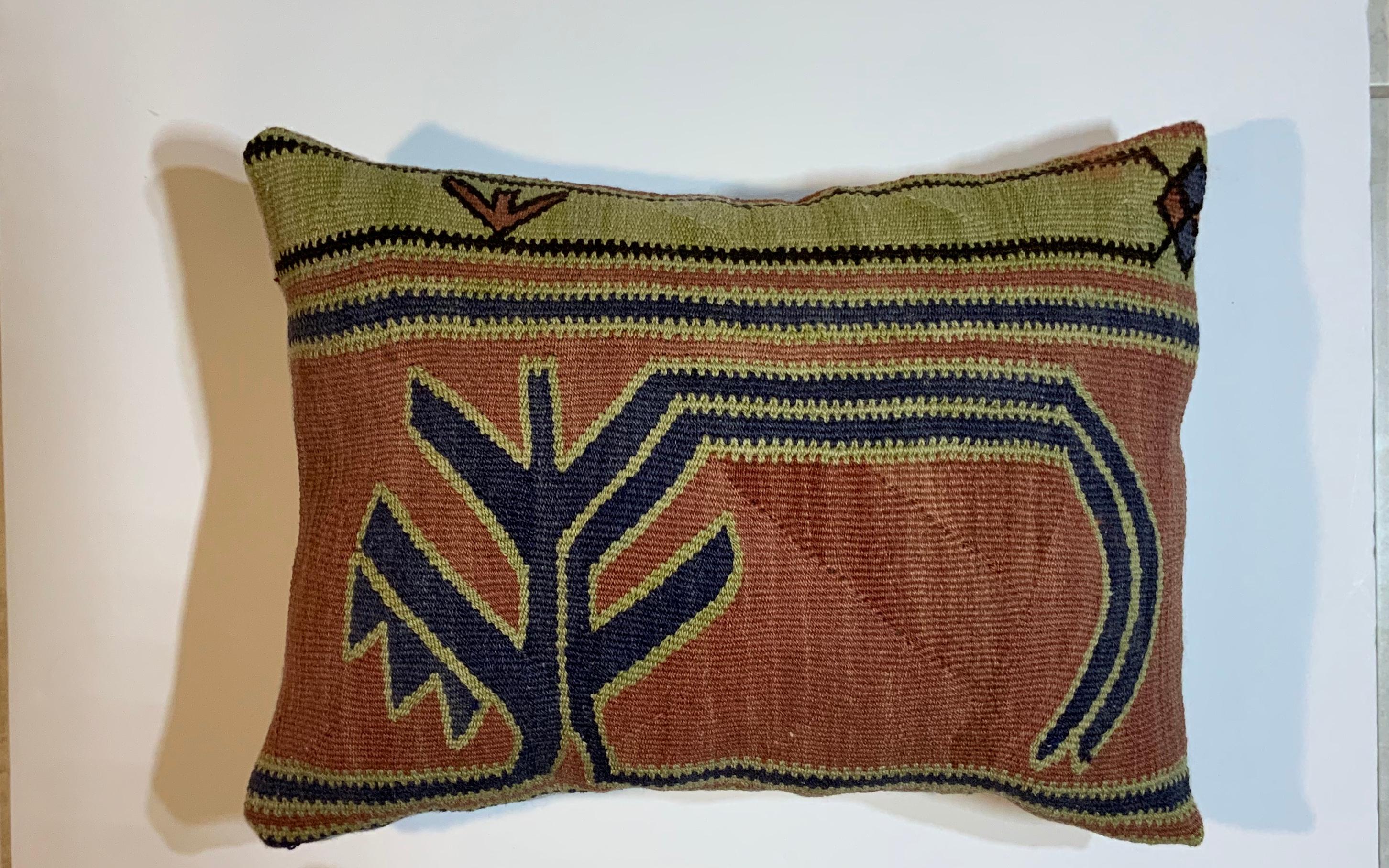Exceptional pair of pillows made of handwoven flat-weave antique rug fragment, beautiful geometric motif.
Fine linen backing, frash inserts.
Sizes:
1. 10” x 13” x 4”
2. 11” x 15” x 4”.
