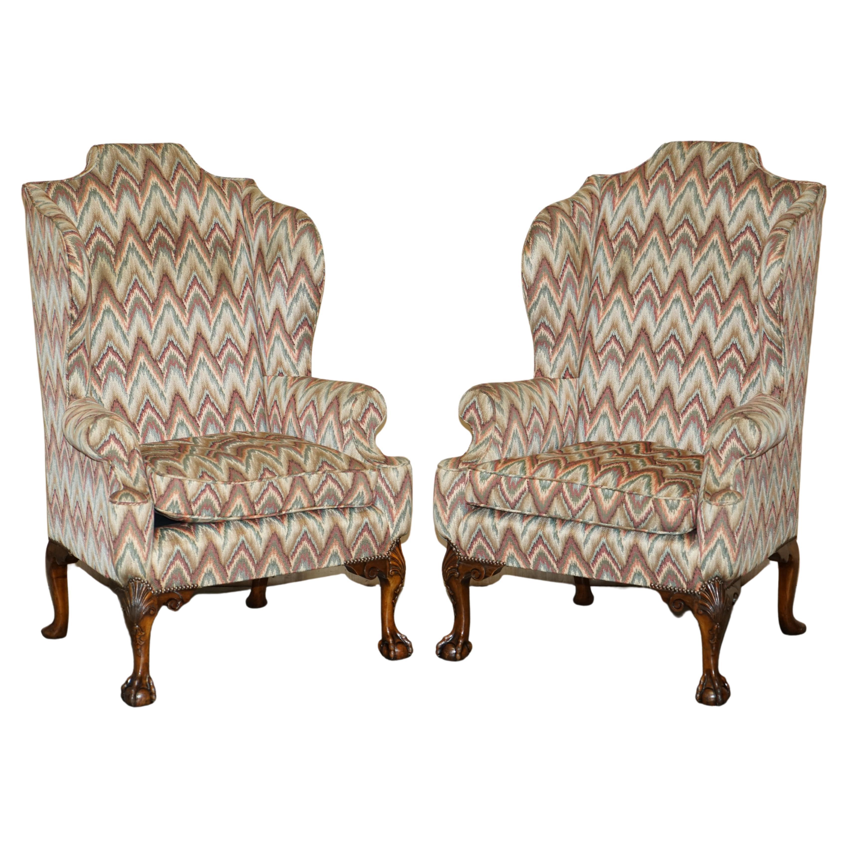 Royal House Antiques

Royal House Antiques is delighted to offer for sale this exquisite pair of Antique circa 1900-1920 extra large wingback armchairs with hand carved Claw & Ball Cabriolet legs and Kilim style upholstery fabric 

Please note the