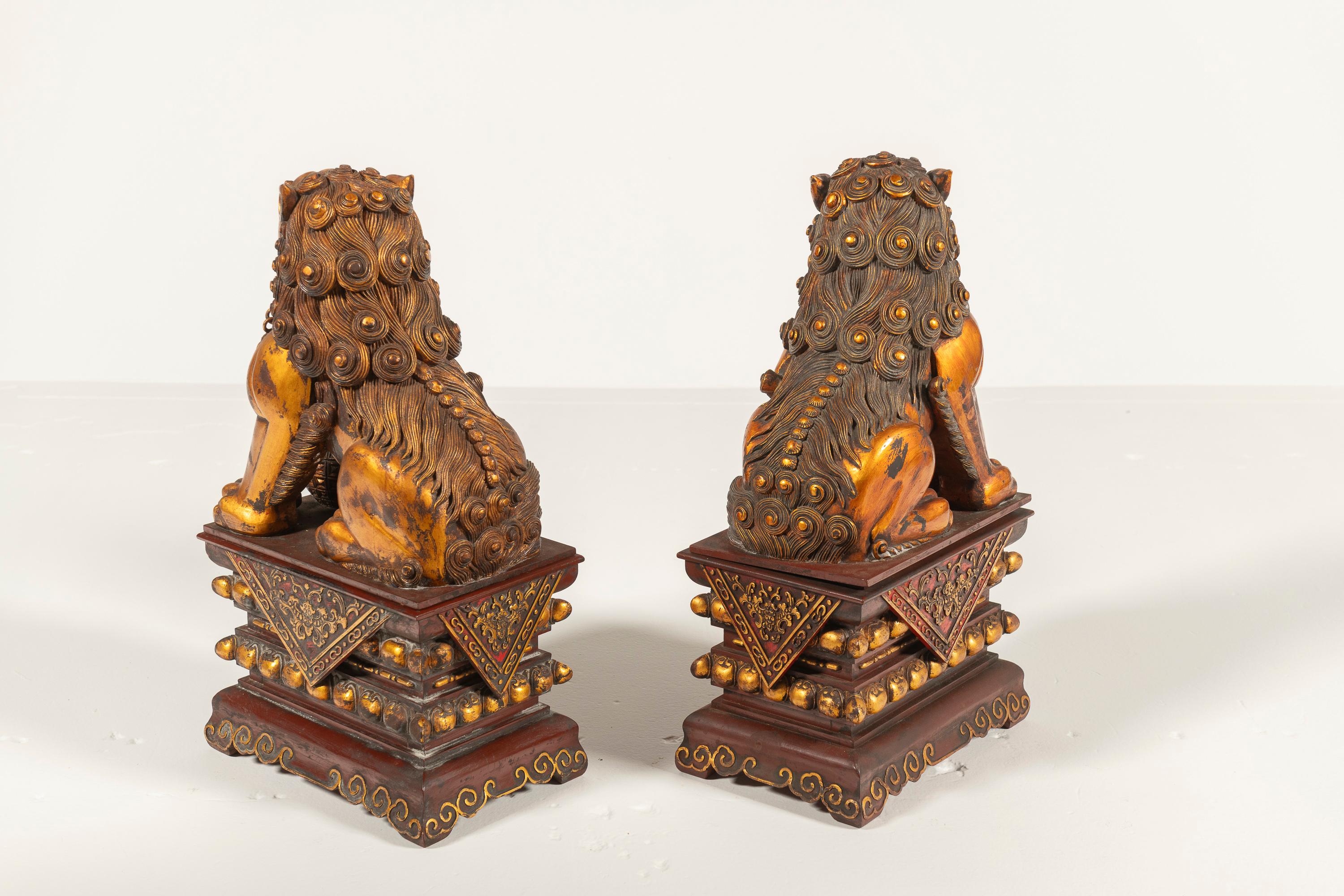 Wood Pair of Antique Large Chinese Lacquered, Gilded Foo Dogs on Ornate Bases, China For Sale