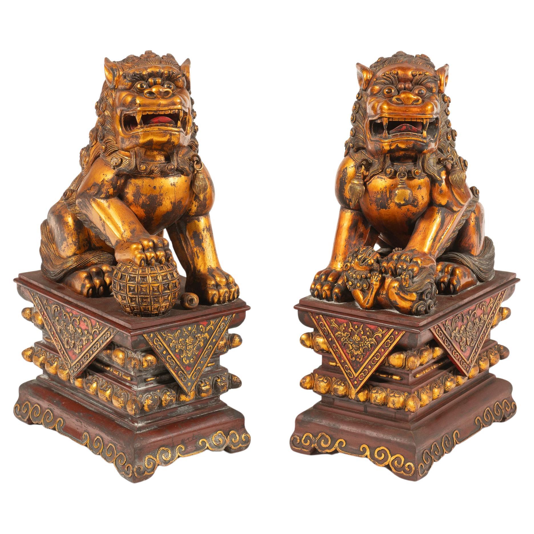 Pair of Antique Large Chinese Lacquered, Gilded Foo Dogs on Ornate Bases, China