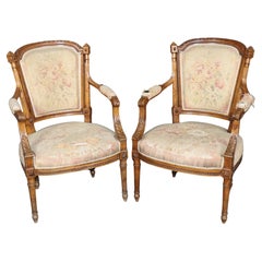 Pair of Antique Late 19th Century French Walnut Carved Distressed Armchairs