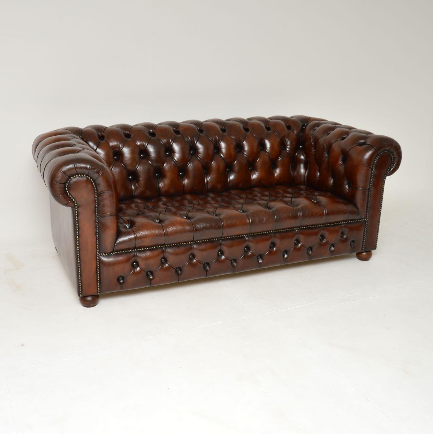 English Pair of Antique Leather Chesterfield Sofas