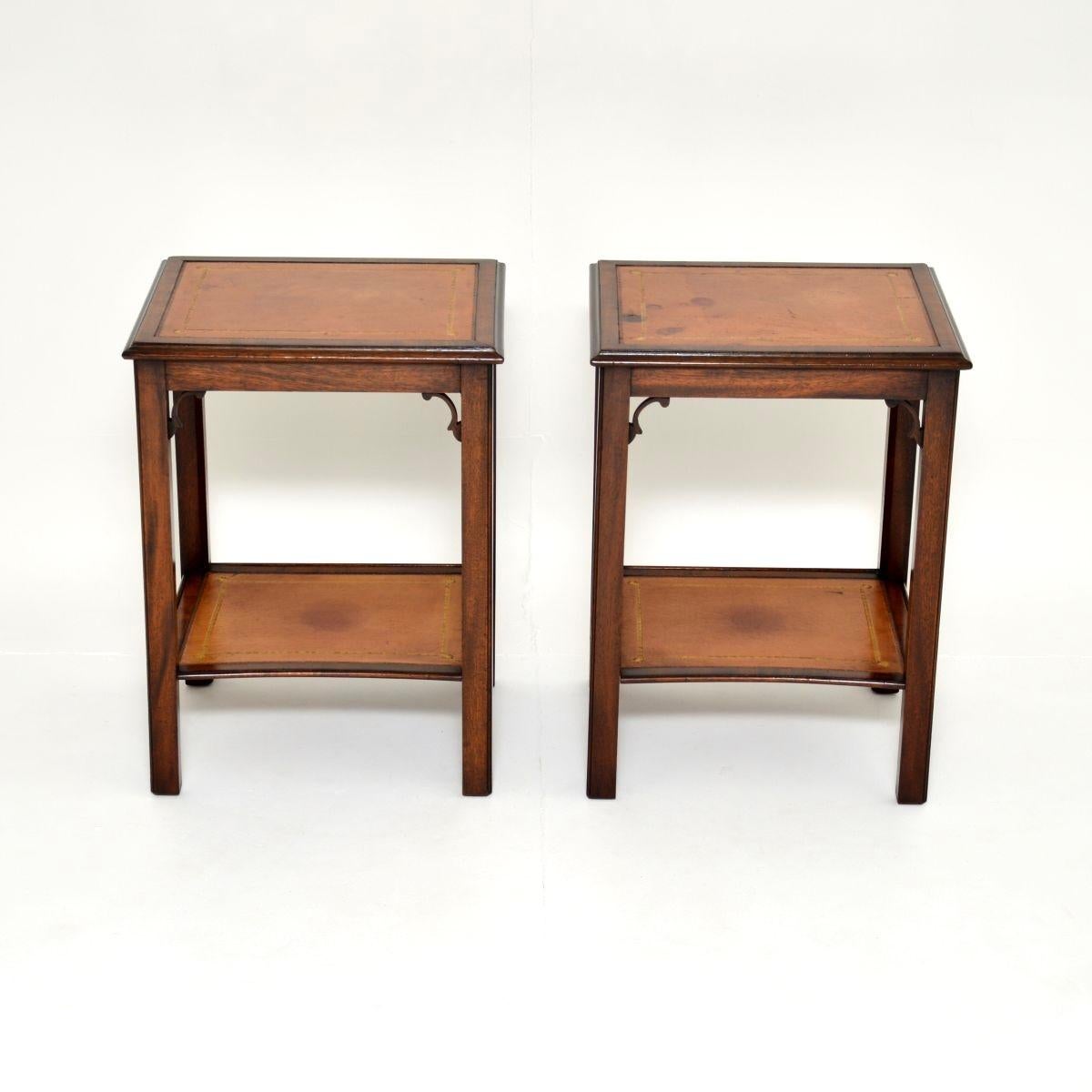 A very smart pair of antique leather side tables. They were made in England and date from around the 1900-1920 period.

They are of very fine quality and are a very useful size to go either side of a sofa or as bedside tables. They sit on lovely