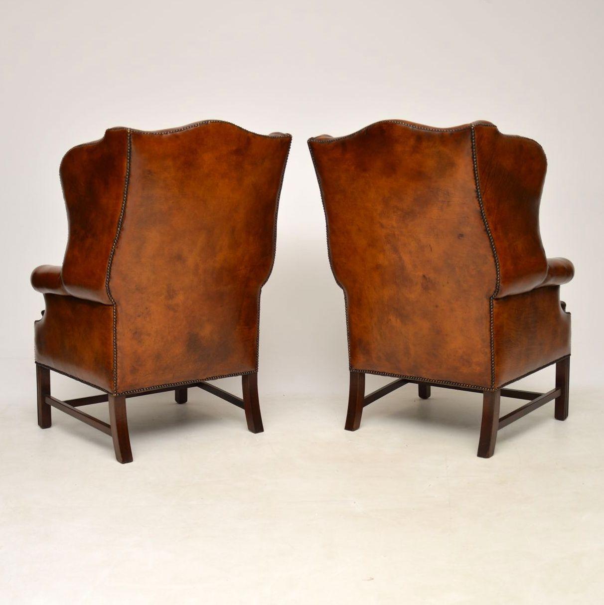 Pair of Antique Leather Wing Back Armchairs 6