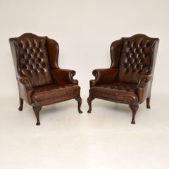 Pair of Antique Leather Wing Back Armchairs