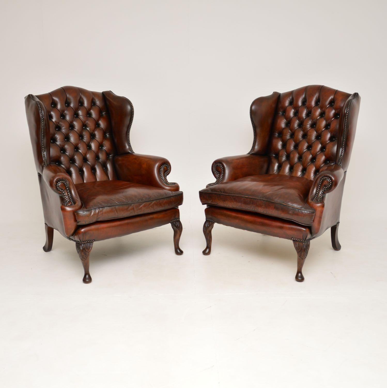 A fantastic pair of antique leather wing back armchairs. They were made in England, and date from around the 1930-50’s.

The quality is amazing, they have deep buttoned hump shaped backs, scroll over arms and sit on solid wood cabriole legs. The