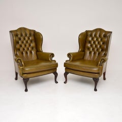 Pair of Antique Leather Wing Back Armchairs