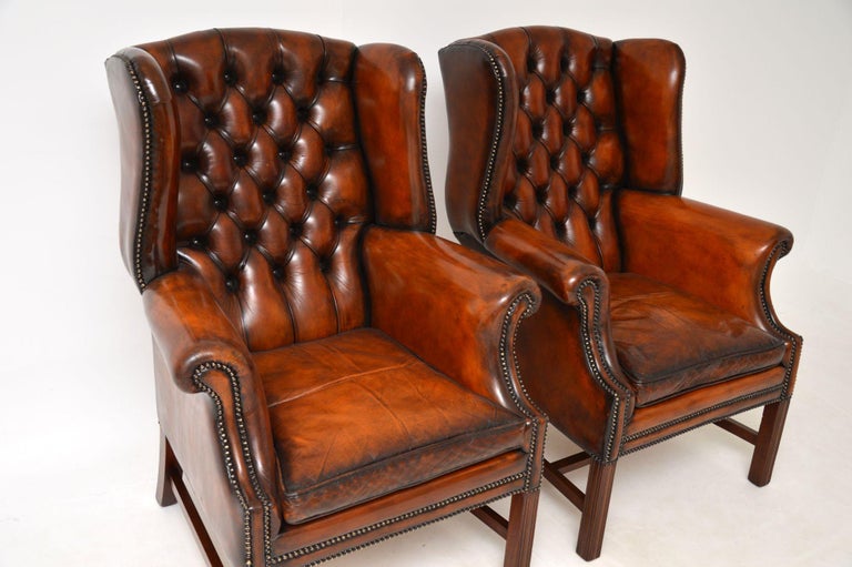 English Pair of Antique Leather Wing Back Armchairs
