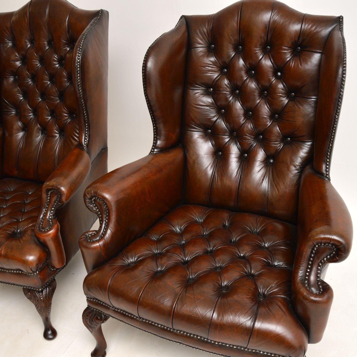 English Pair of Antique Leather Wing Back Armchairs