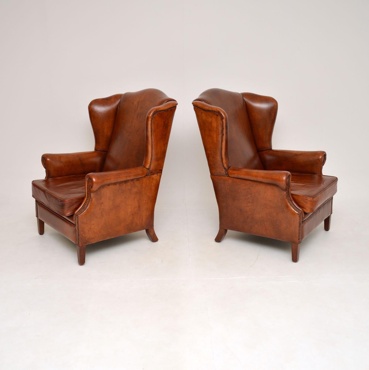French Pair of Antique Leather Wing Back Armchairs