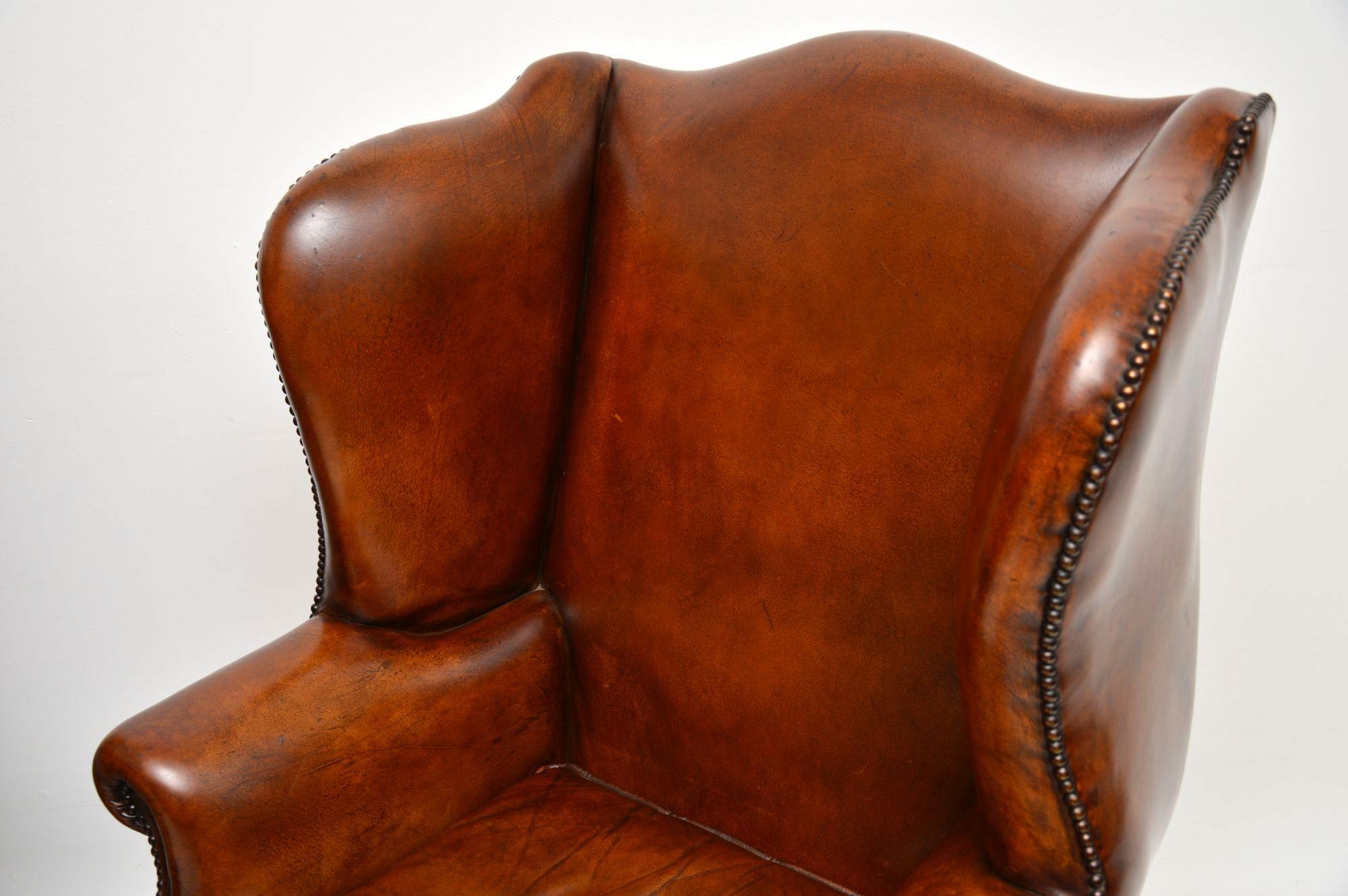 Mid-20th Century Pair of Antique Leather Wing Back Armchairs