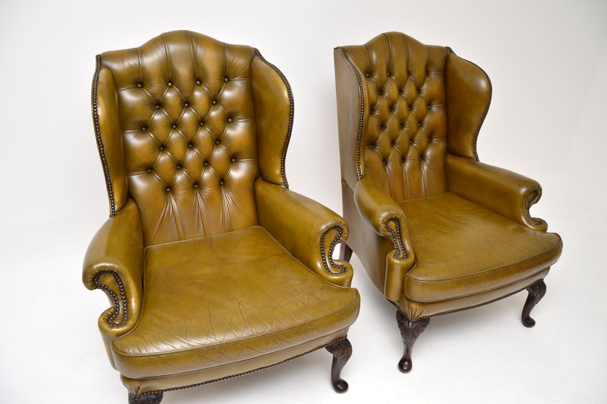 Mid-20th Century Pair of Antique Leather Wing Back Armchairs For Sale