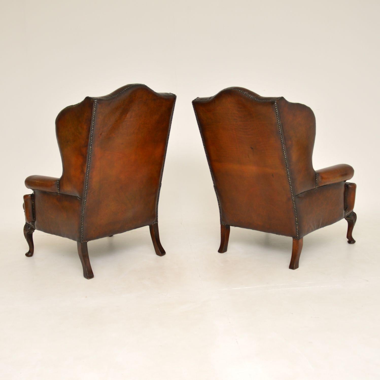 Pair of Antique Leather Wing Back Armchairs 1