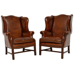 Pair of Antique Leather Wing Back Armchairs