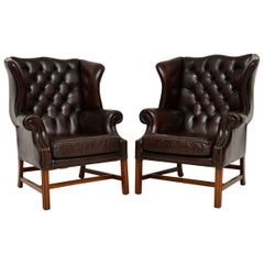 Pair of Antique Leather Wing Back Armchairs