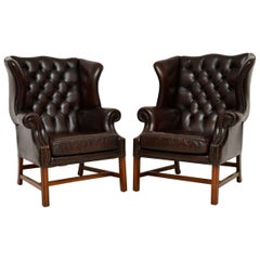 Pair of Antique Leather Wing Back Armchairs