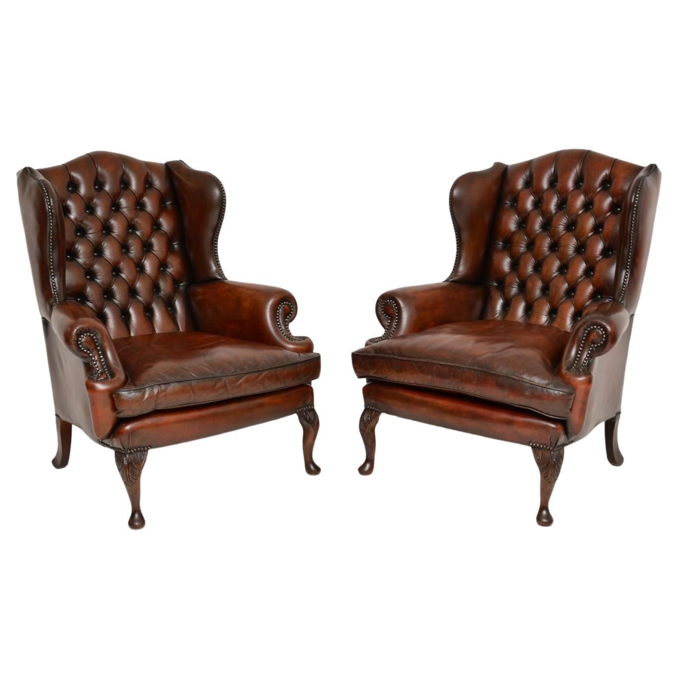 Pair of Antique Leather Wing Back Armchairs