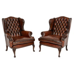 Pair of Antique Leather Wing Back Armchairs