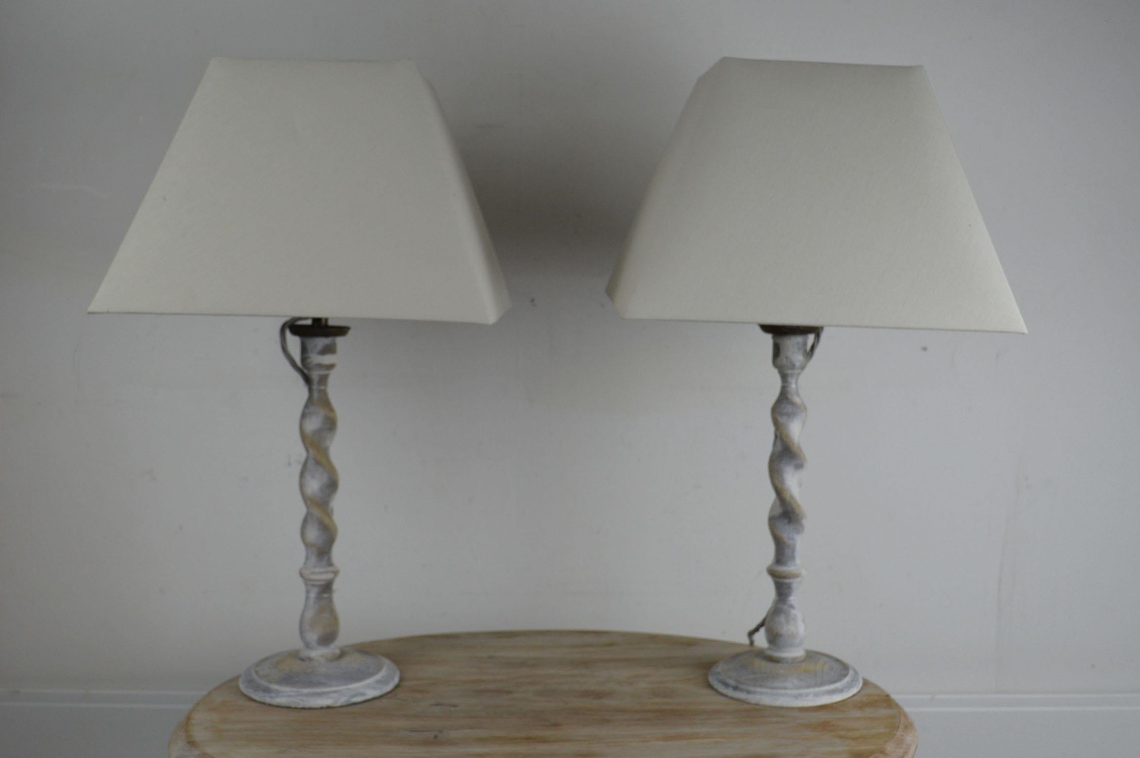 Super pair of limed oak twist table lamps.

English. Early 20th century

Converted from candlesticks.

 Wired to UK standards.

Shades included.
  
